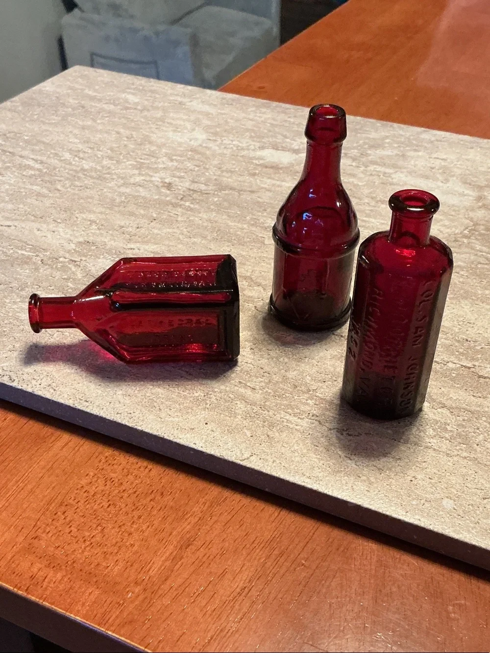 Set of 3 vintage Wheaton celebrated remedy ruby red bitters bottles.